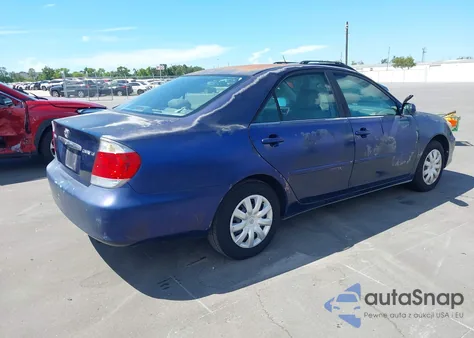2005 Toyota Camry Le z USA, uszkodzony, nr VIN 4T1BE32K15U090880